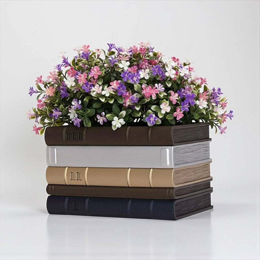 Custom multicolor Orven 2 book stack planter with decorative purple and white flowers