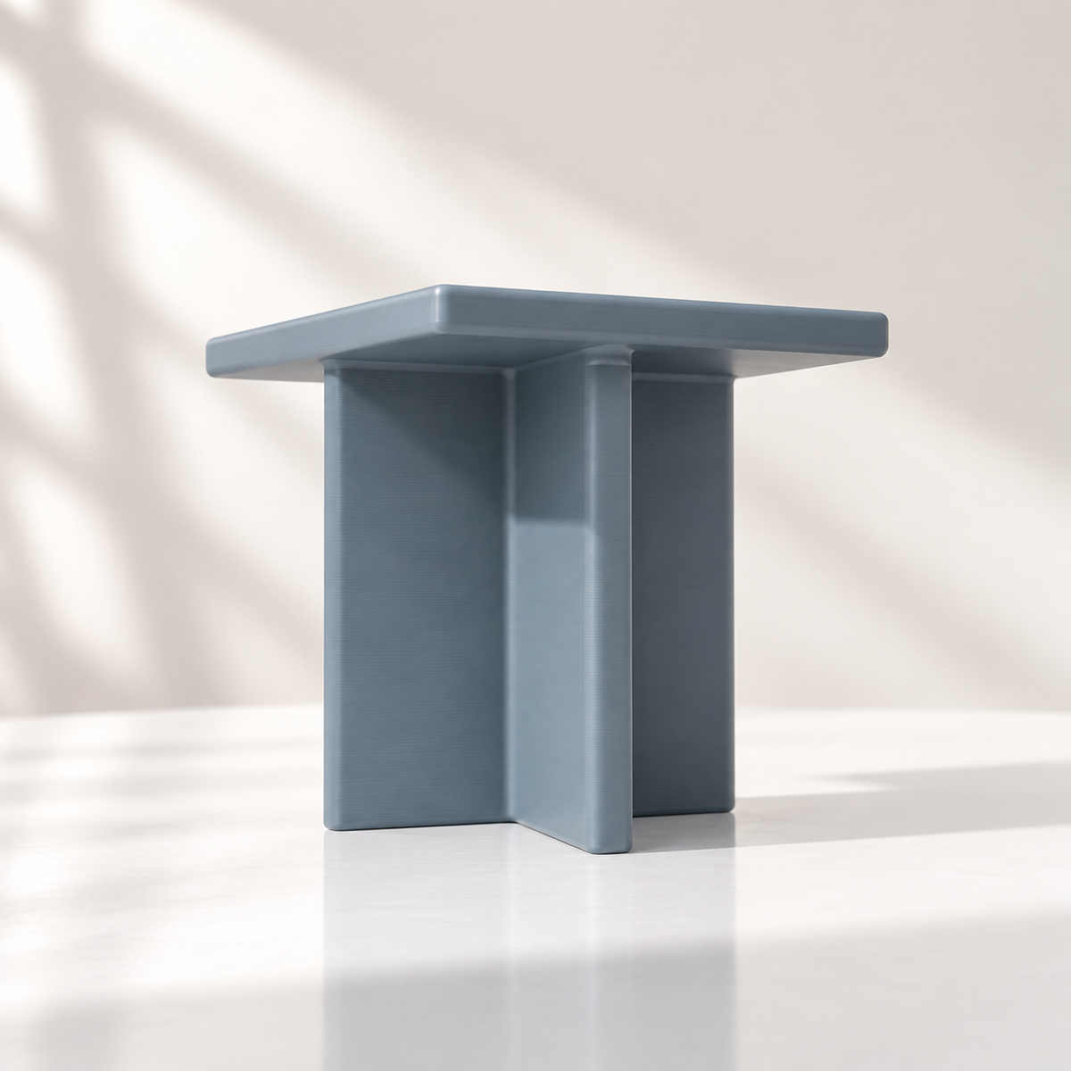 Low-angle view of the Plane square plant stand showing its two intersecting vertical support panels