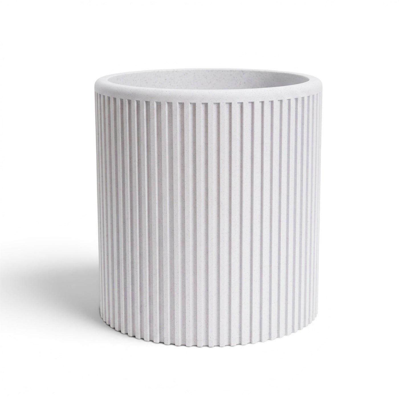 Sano even vertical ribs and a clean cylindrical silhouette indoor planter, top opening view