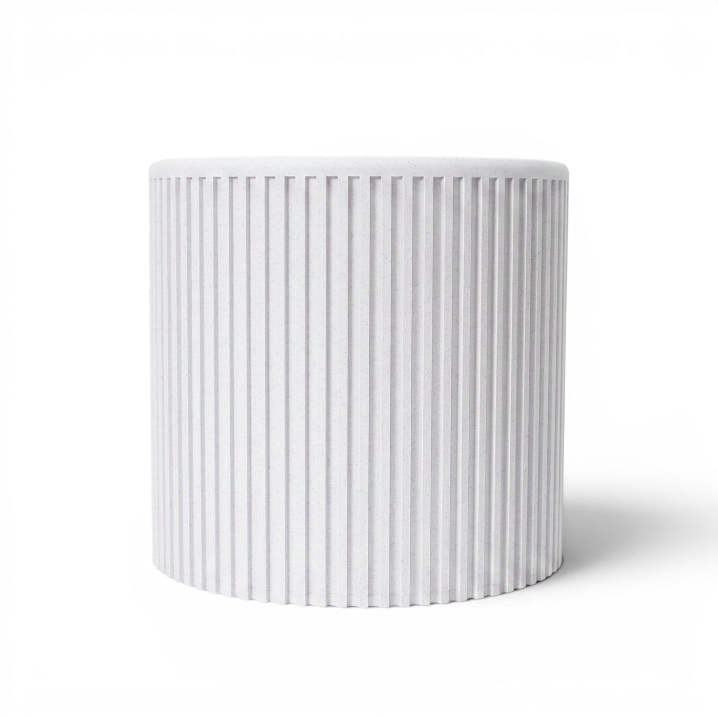 Sano even vertical ribs and a clean cylindrical silhouette indoor planter, side view