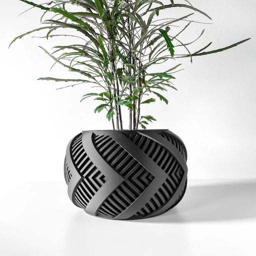 3D printed planter pot with a smooth oval silhouette and deep diagonal cutouts arranged in a crosshatch pattern, creating bold contrast between solid and negative space