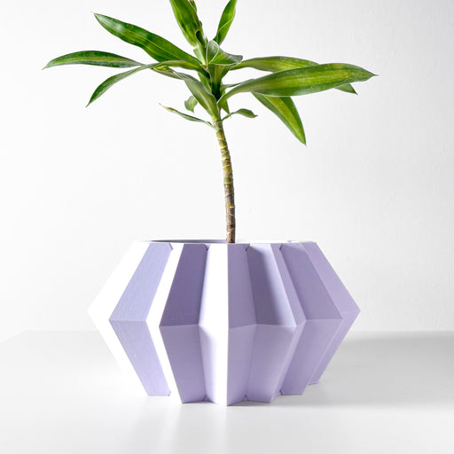 Hexagonal 3D printed planter pot in matte finish with bold faceted structure and angular sides