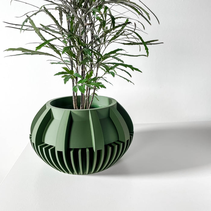 Modern artistic planter pot, 3D printed geometric succulent pot featuring sculptural ribbed surface, decorative tabletop flower pot with stylish textured detail and drainage hole