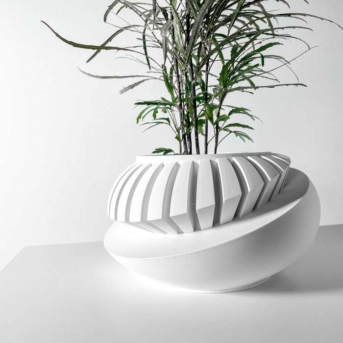 Side view of oval tilted modern planter pot with unique layered texture, stylish sculptural planter, contemporary 3D printed pot for indoor plants and succulents