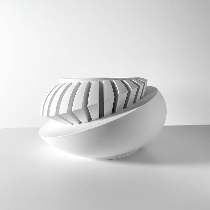 Front view of stylish oval layered 3D printed planter pot with sleek geometric design, decorative tabletop flower pot, modern planter for small cacti and plants