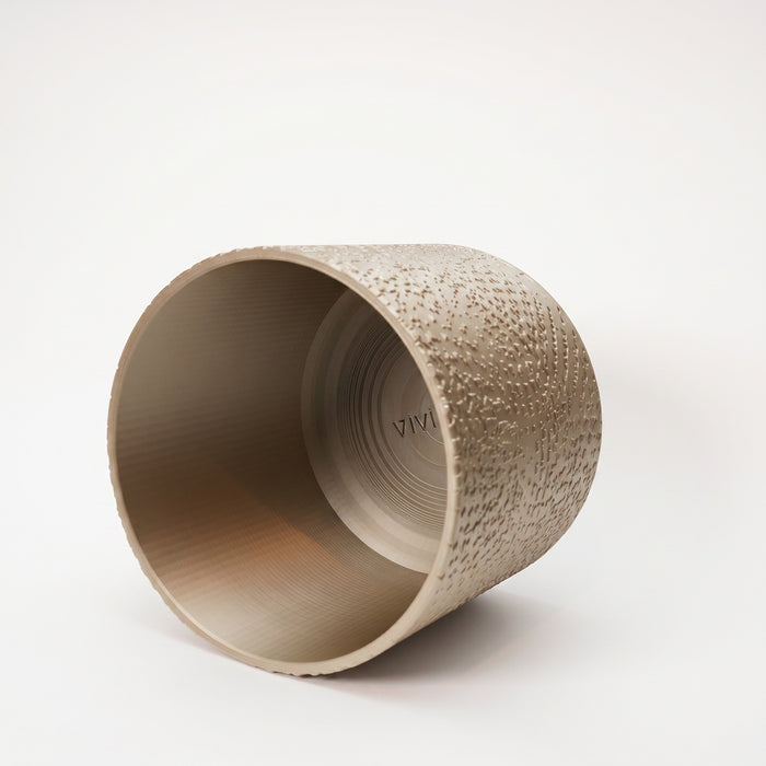 Aureo planter pot shown on its side with inner planting space 