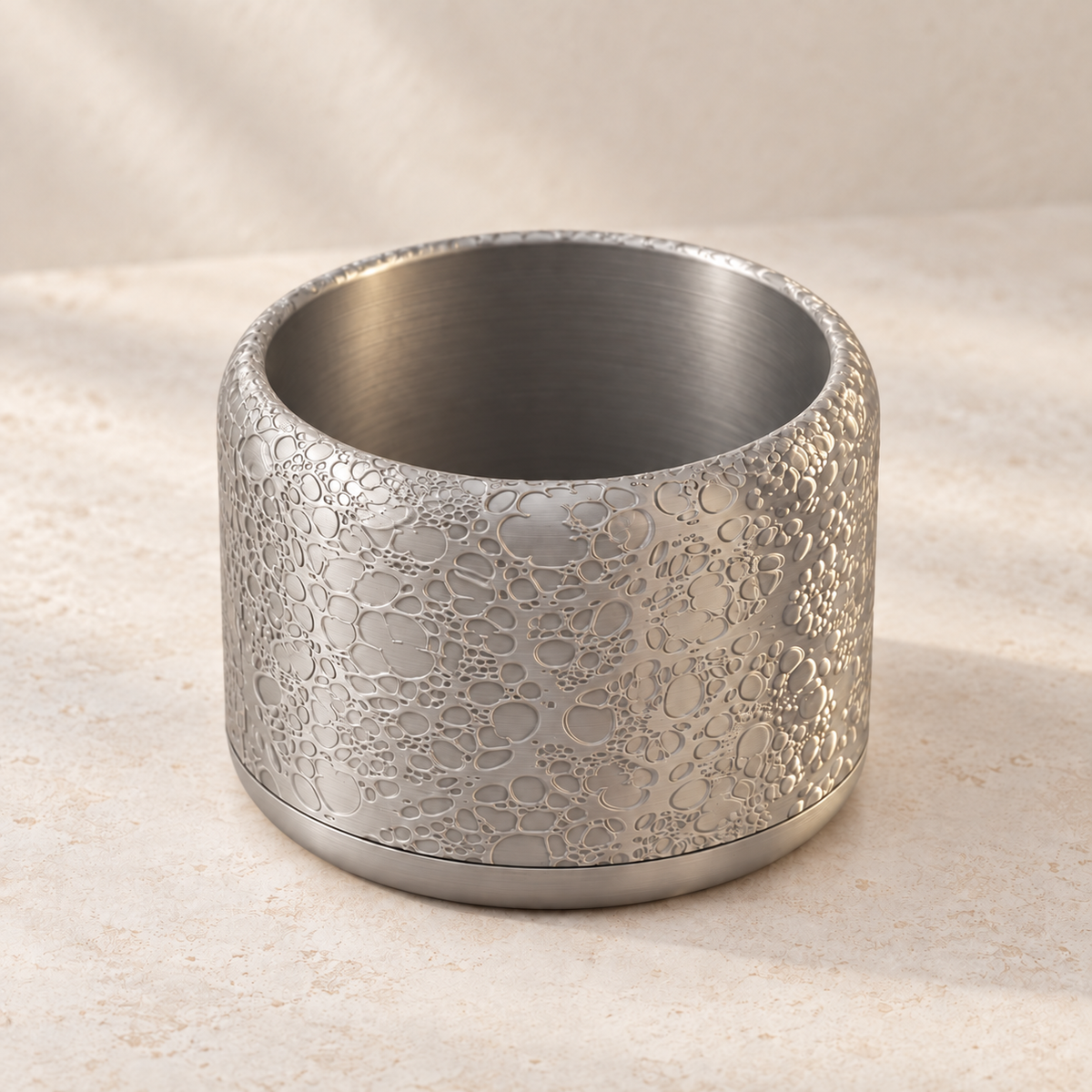 Aero decorative indoor planter featuring organic bubble and crater-like texture