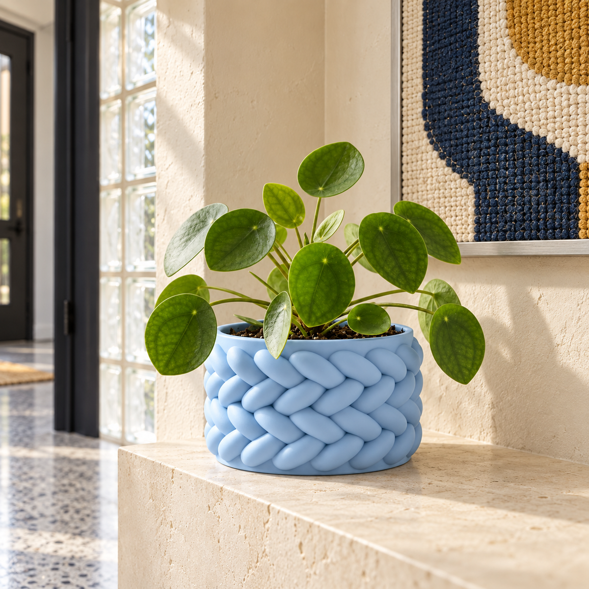 Braido woven planter styled to show soft braid-like overlapping texture