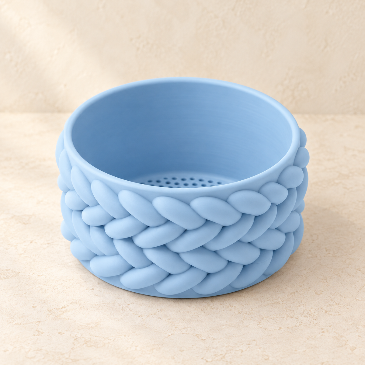Braido decorative woven planter featuring soft braid-like overlapping texture