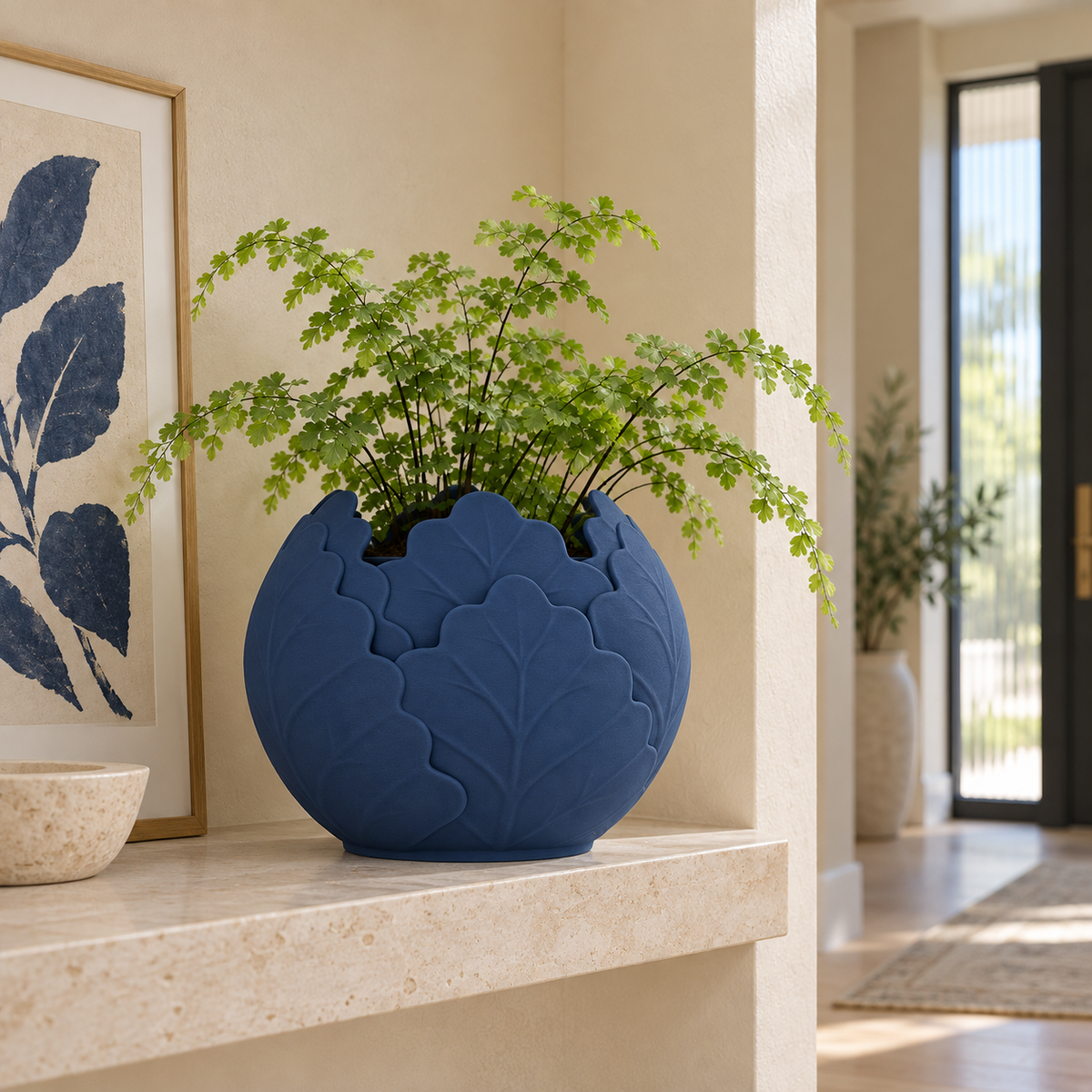 Folira decorative round planter featuring layered leaf relief with raised vein detail