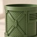 Textured industrial planter with cross-brace motif for modern houseplants