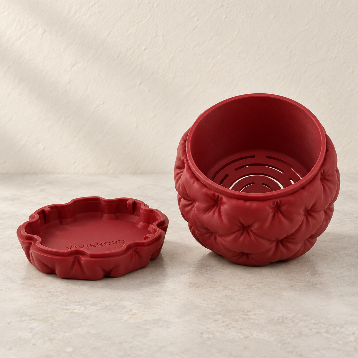 Kivu decorative sculptural planter featuring soft padded-looking raised forms