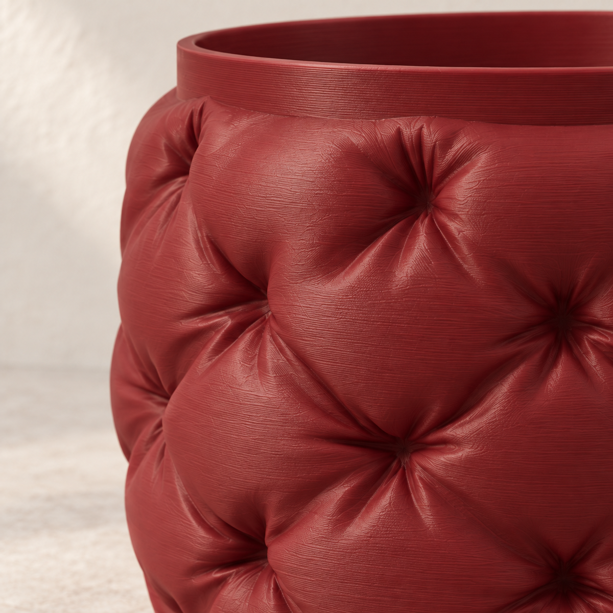 Kivu sculptural planter with distinctive soft padded-looking raised forms