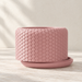 Pelta decorative sculptural planter featuring ordered overlapping scale texture