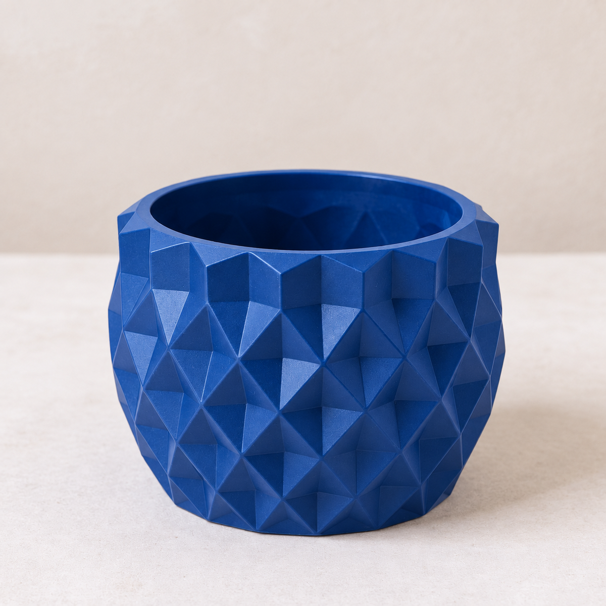 Prizma decorative geometric planter featuring faceted triangular planes