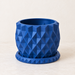 Prizma geometric planter showing faceted triangular planes across the design