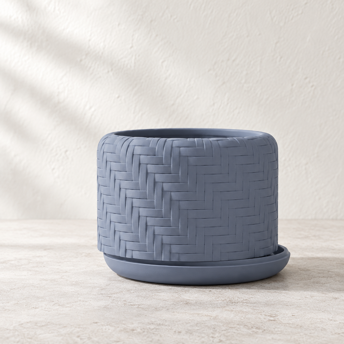Ravena woven planter showing basket-like over-under texture across the design