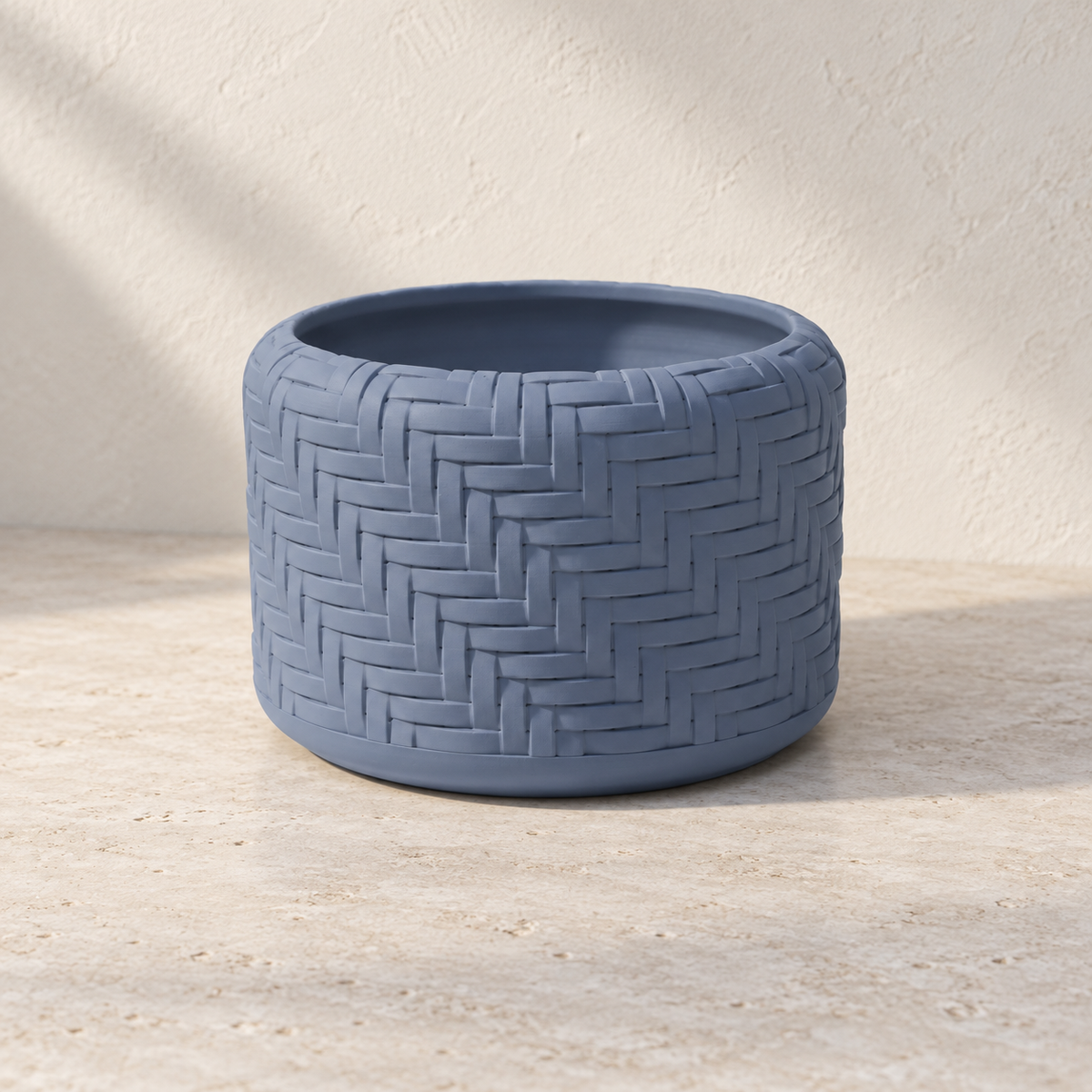 Ravena decorative woven planter featuring basket-like over-under texture