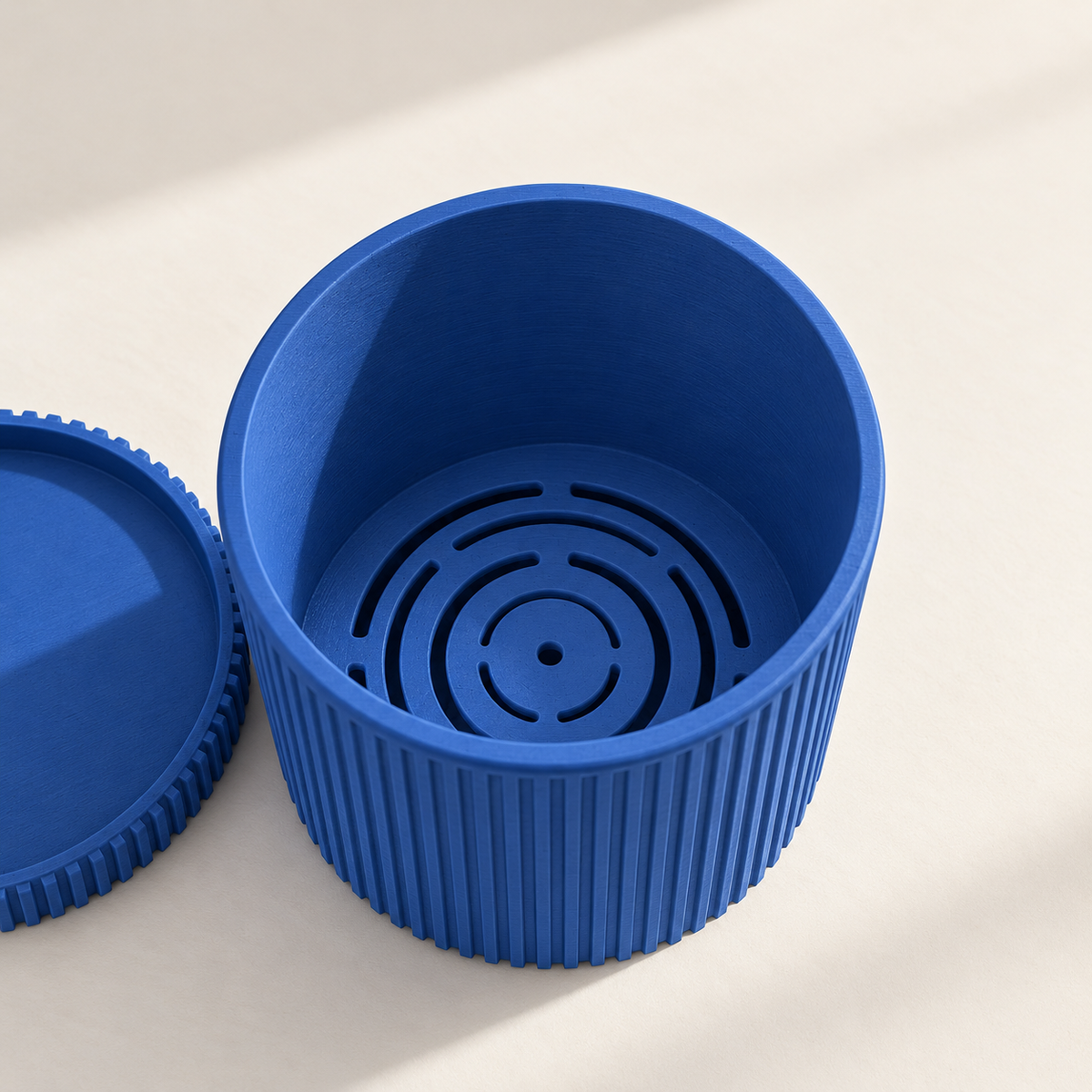 Sano decorative indoor planter featuring continuous vertical ribbed texture