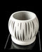 abstract spherical pot with rhythmic vertical slices and contrasting interior texture, made via 3D printing, hollow structure highlighted by sculptural geometry, displayed on transparent base, decorative flower pot, statement planter for unique decor setups