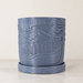 Timberline decorative indoor planter featuring sculpted woodgrain-style surface