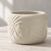 Back view of Tropica round planter showing the continuous botanical leaf texture