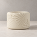 Tropica leaf planter shown with its textured tropical relief and rounded cylindrical shape