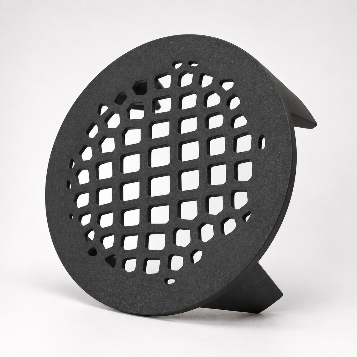 Black Grid Base plant riser resting on its edge to display the round lattice platform.