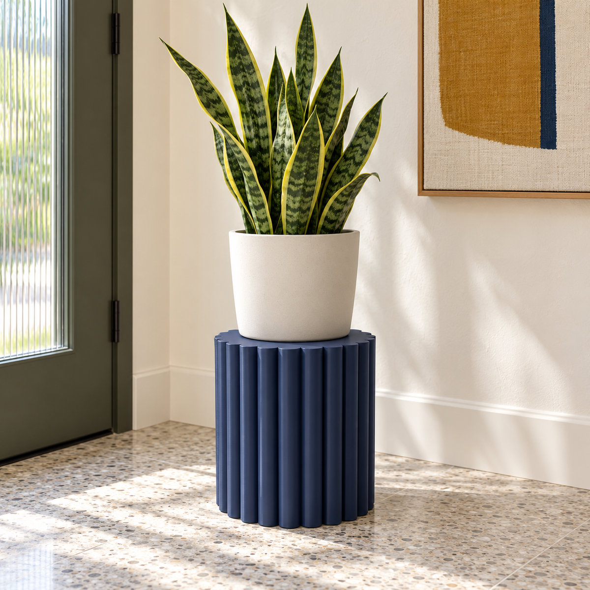 Pillar round plant stand with continuous fluted pedestal lines
