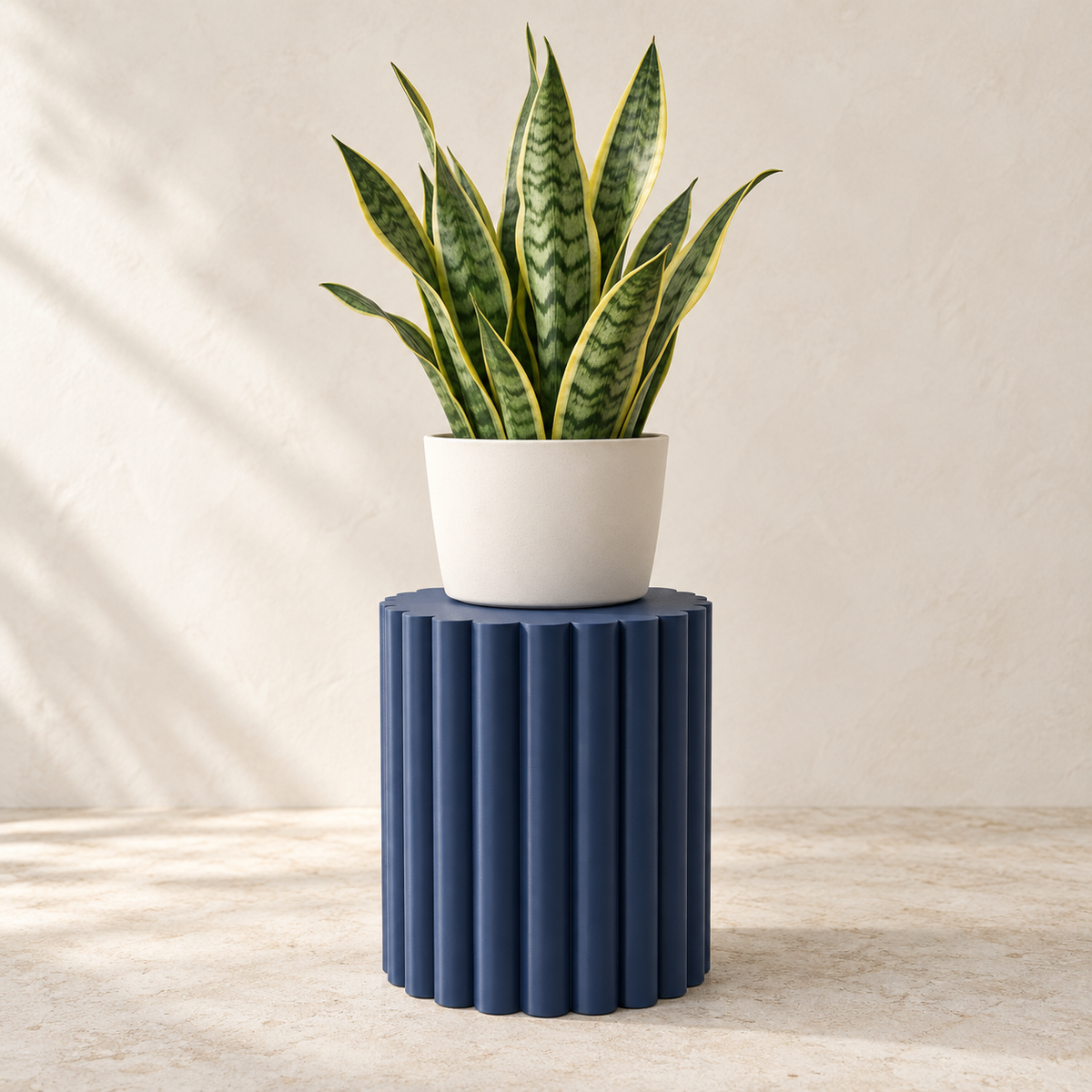 Pillar round plant stand styled to show continuous fluted pedestal lines
