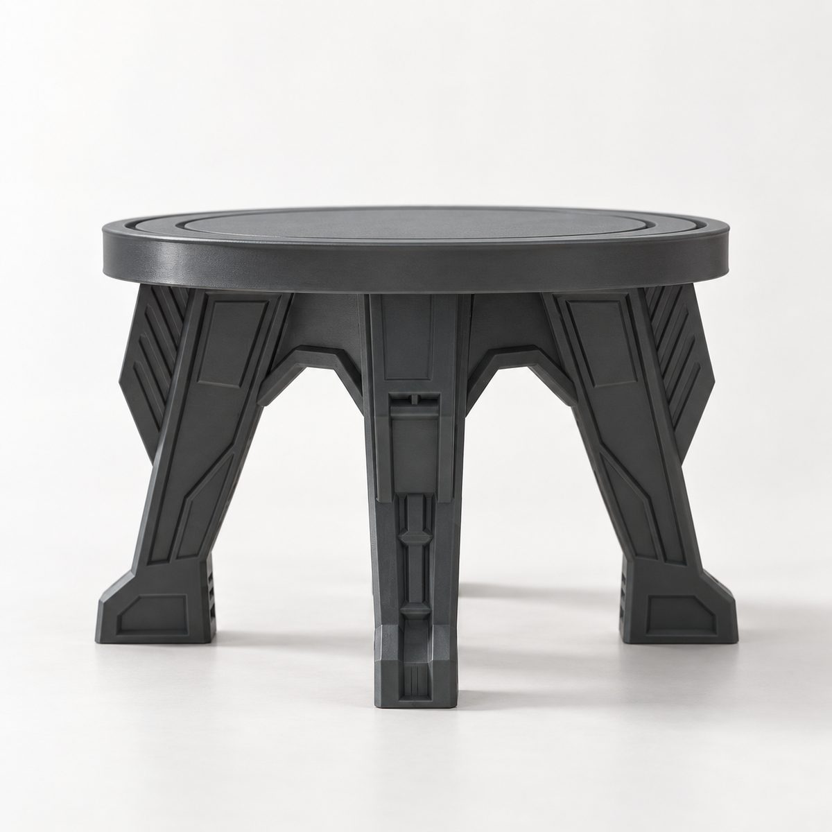 Gray Riva plant stand shown from the front, with a round top and angular architectural legs.