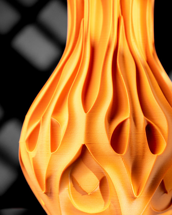 Detail view of Pyra organic vase with flame-petal texture