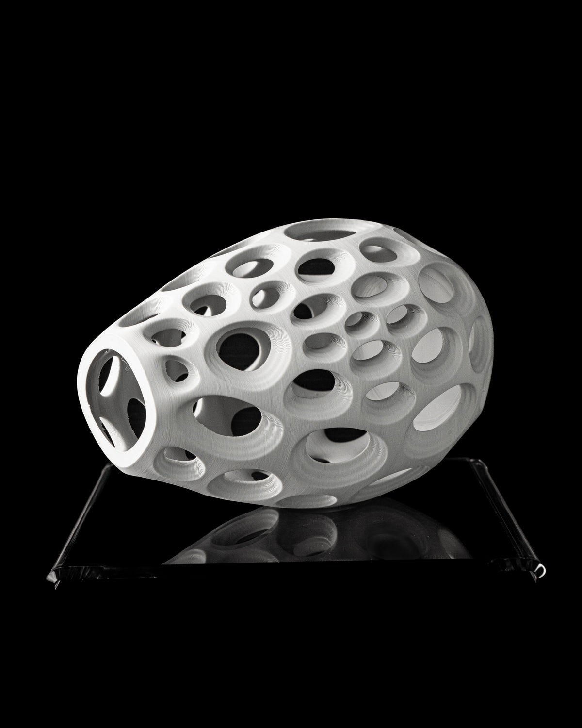 Ringo perforated vase angled side view