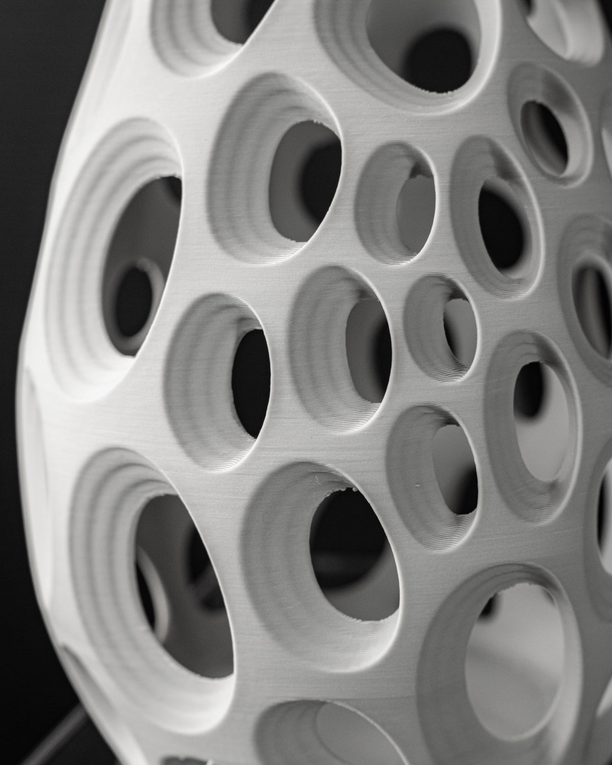 Close-up of Ringo vase circular opening texture