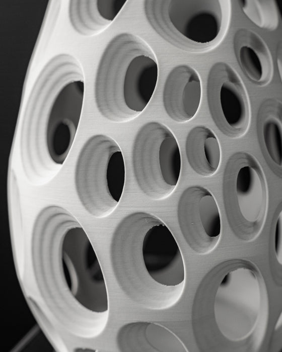 Close-up of Ringo vase circular opening texture