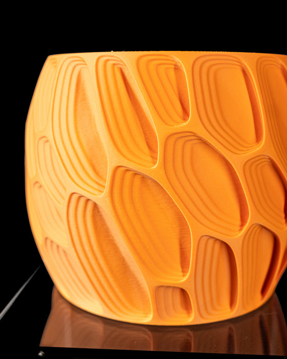 Close-up of Ringo planter organic contour texture
