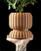 Riven ribbed pedestal planter with rounded fluted body and matching sculptural base
