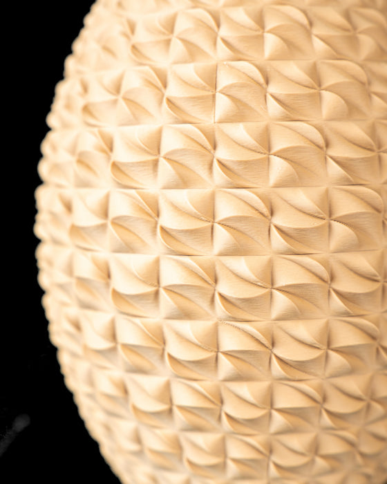 Close-up of Sando vase folded geometric texture