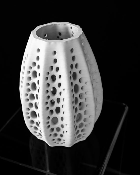 Seashell perforated vase angled product view