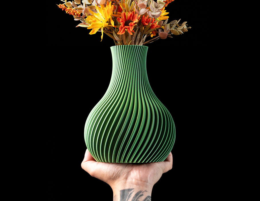 Sorel fluted round vase with sweeping spiral ribs and dried flowers