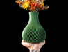 Sorel fluted round vase with sweeping spiral ribs and dried flowers