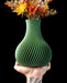 Sorel sculptural flower vase in green with curved fluted texture