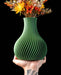 Sorel sculptural flower vase in green with curved fluted texture