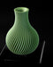 Angled view of Sorel ribbed vase with rounded body and narrow neck