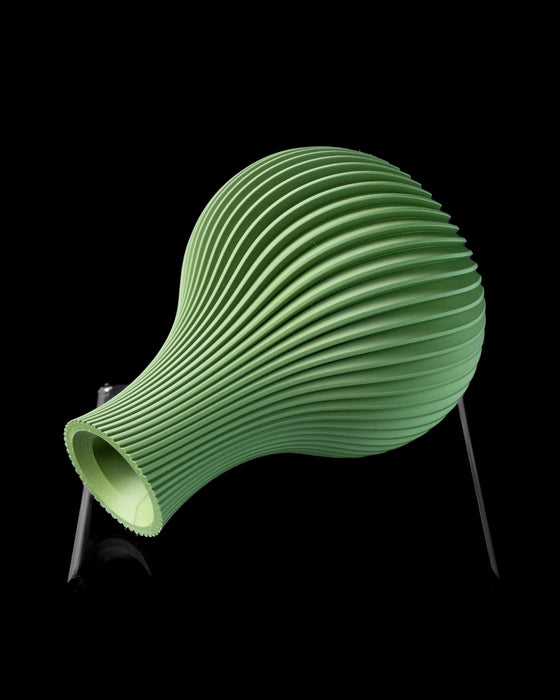 Side view of Sorel round fluted vase showing curved rib pattern