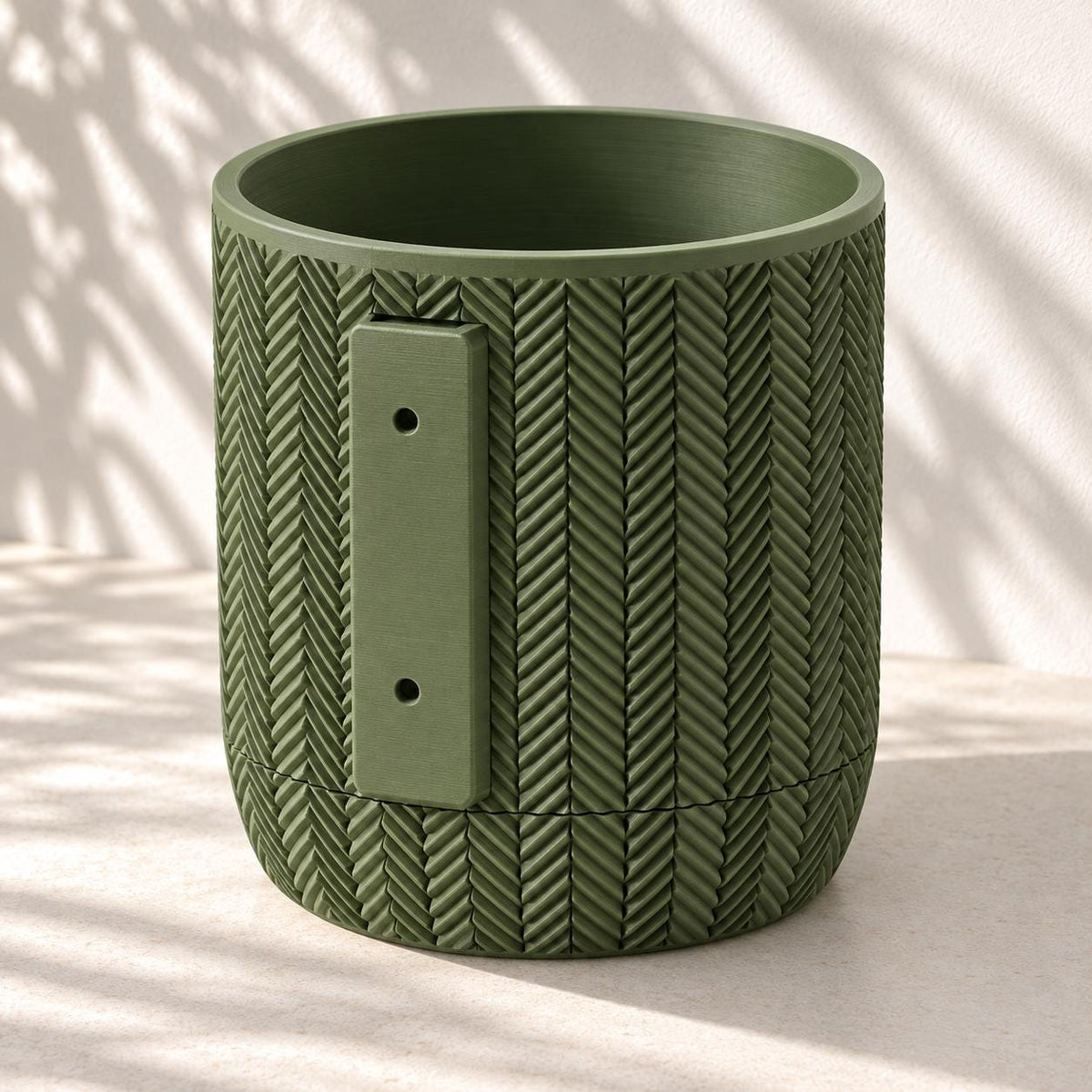 Rear view of the Spigo wall planter showing the vertical mounting plate and two fixing holes.