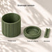 Spigo wall planter components: herringbone planter body, removable lower water collector and wall mounting plate.