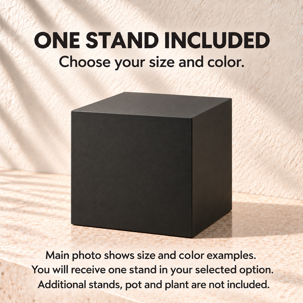 One black square stand with text explaining that one stand in the selected size and color is included; pots and plants are not included.