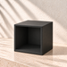 Square plant stand resting on its side to show its hollow open underside, side walls and closed top panel.