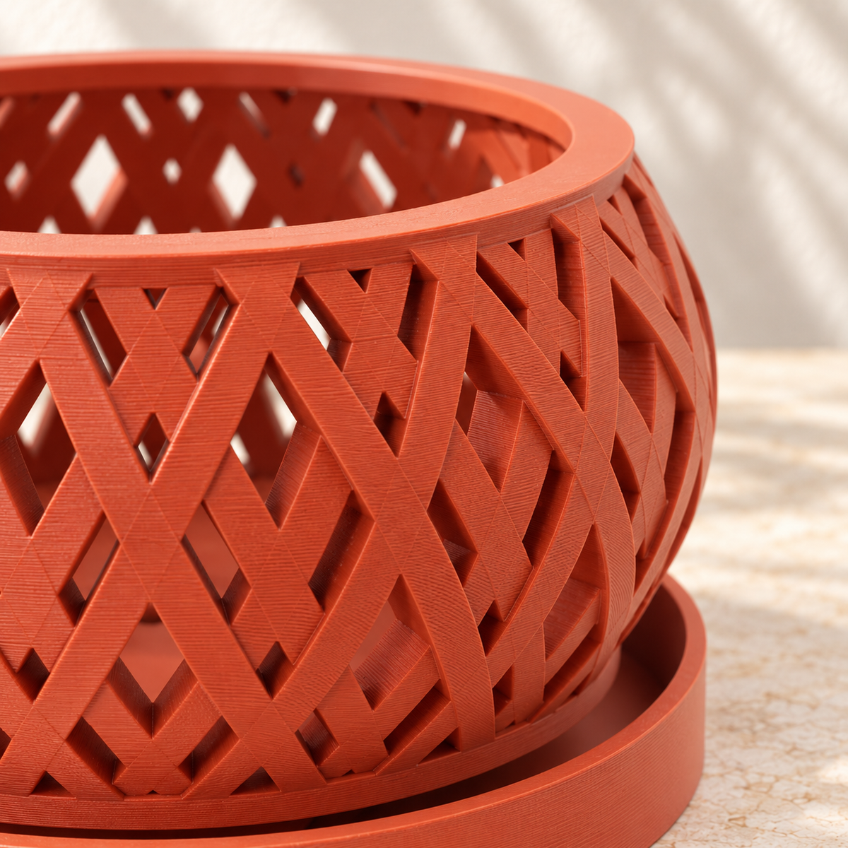 Close-up of Tavero orchid pot showing crossing bands and diamond-shaped openings